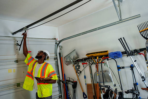 Professional Garage Door Panel Replacement technician working in Pinckney, MI